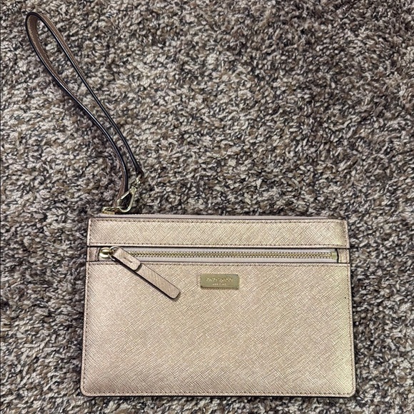 kate spade Handbags - Rose Gold Clutch with Sleek Design and DM Wristlet